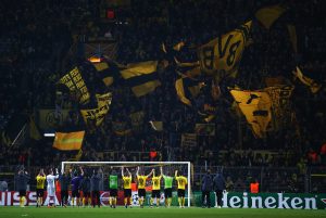 DORTMUND, GERMANY - DECEMBER 09: Dortmund players acknowledge their fans after the UEFA Champions League Group D match between Borussia Dortmund and RSC Anderlecht at Signal Iduna Park on December 9, 2014 in Dortmund, Germany. (Photo by Alex Grimm/Bongarts/Getty Images)